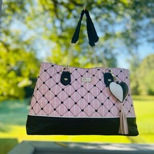 Betsy Johnson quilted tote bag in pink and black with gold-tone hardware.